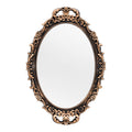Vintage oval bronze framed decorative mirror
